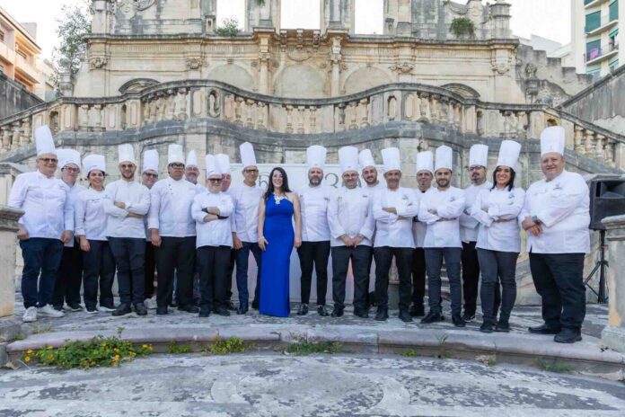Foto pasticceri e chef con Loredana Ermini